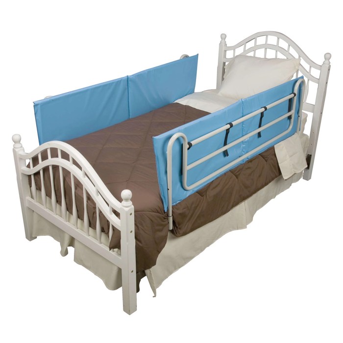 Padded side rails for hospital beds